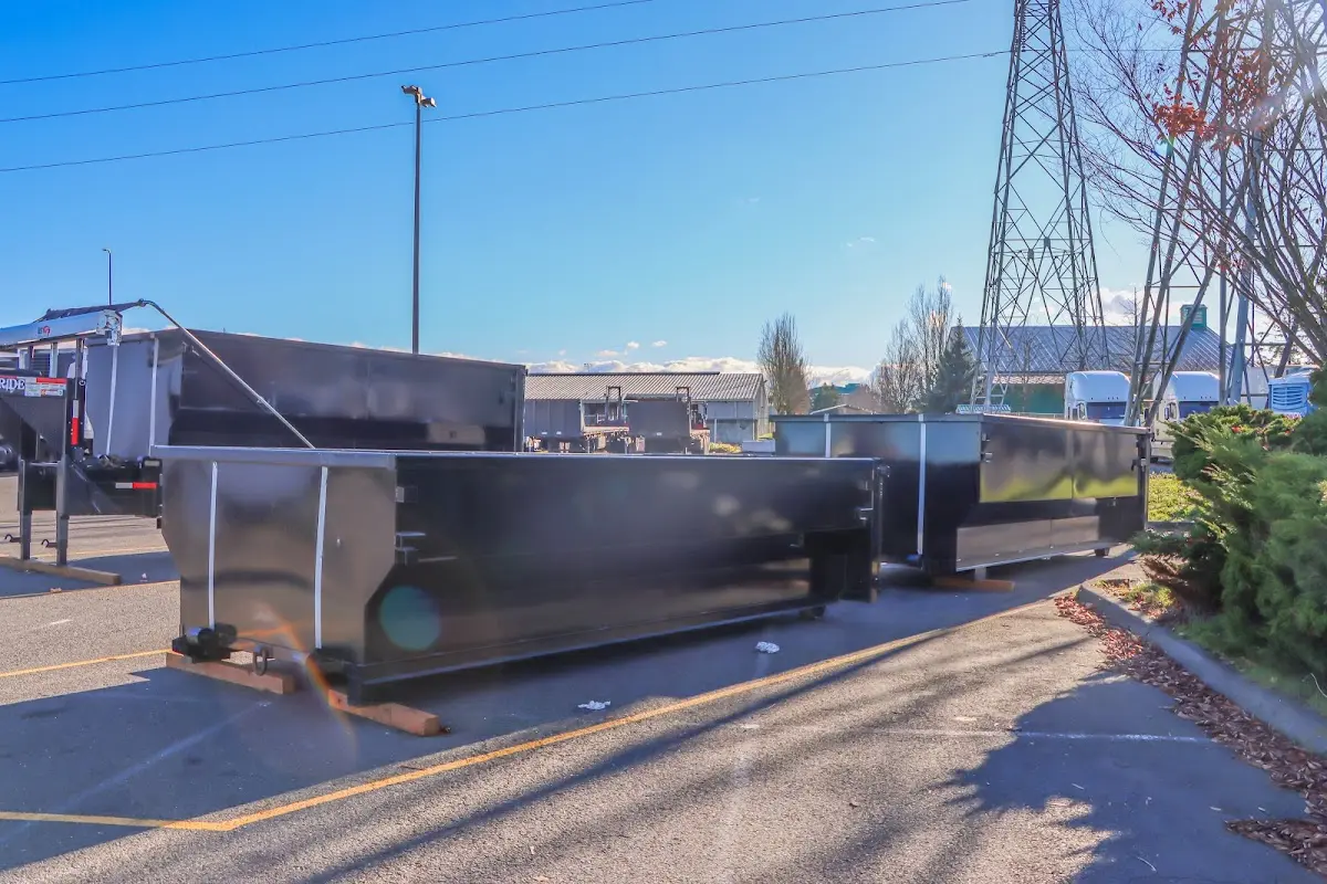 Roll-off dumpster ready for waste disposal at job site for 4 Yard Dumpster Rental in Lowell
